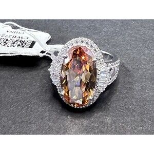 Bella Luce Rhodium Plated Sterling Silver Champagne White Sim Diamond Ring